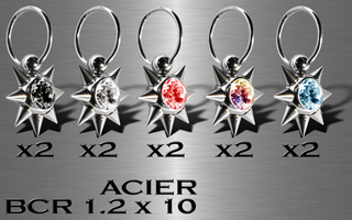 lot de 10 anneaux acier multi cones avec pierre serties. 1.2 x 10