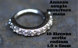 anneau souple 1.0 x 6 - 10 zircons cristal sertis sur base rodium